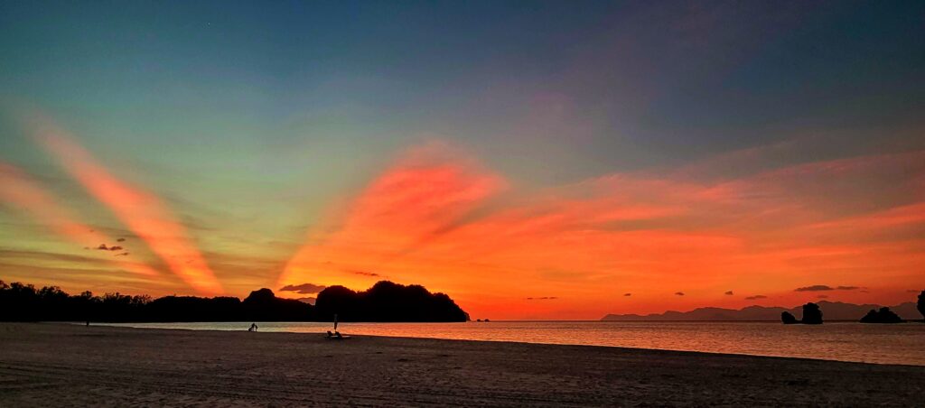 Sunset at Tanjung Rhu Beach with limestone islands in Langkawi