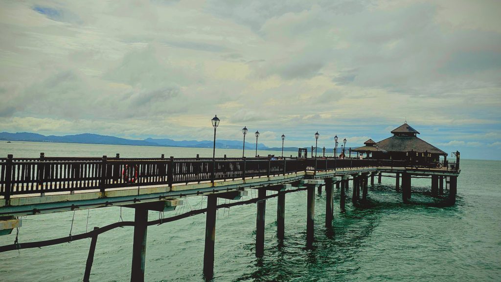 Pahn-Thai Restaurant at Berjaya Langkawi, sitting above the water with ocean views and surrounding islands.
