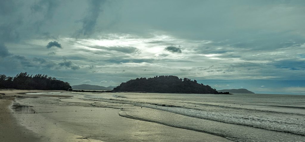 Quiet private beach at Berjaya Langkawi with ocean views and soft morning light