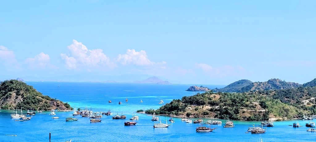 Mix of boats and yachts anchored in Labuan Bajo