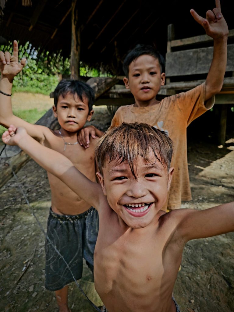 Mentawai kids smiling in the Siberut village.