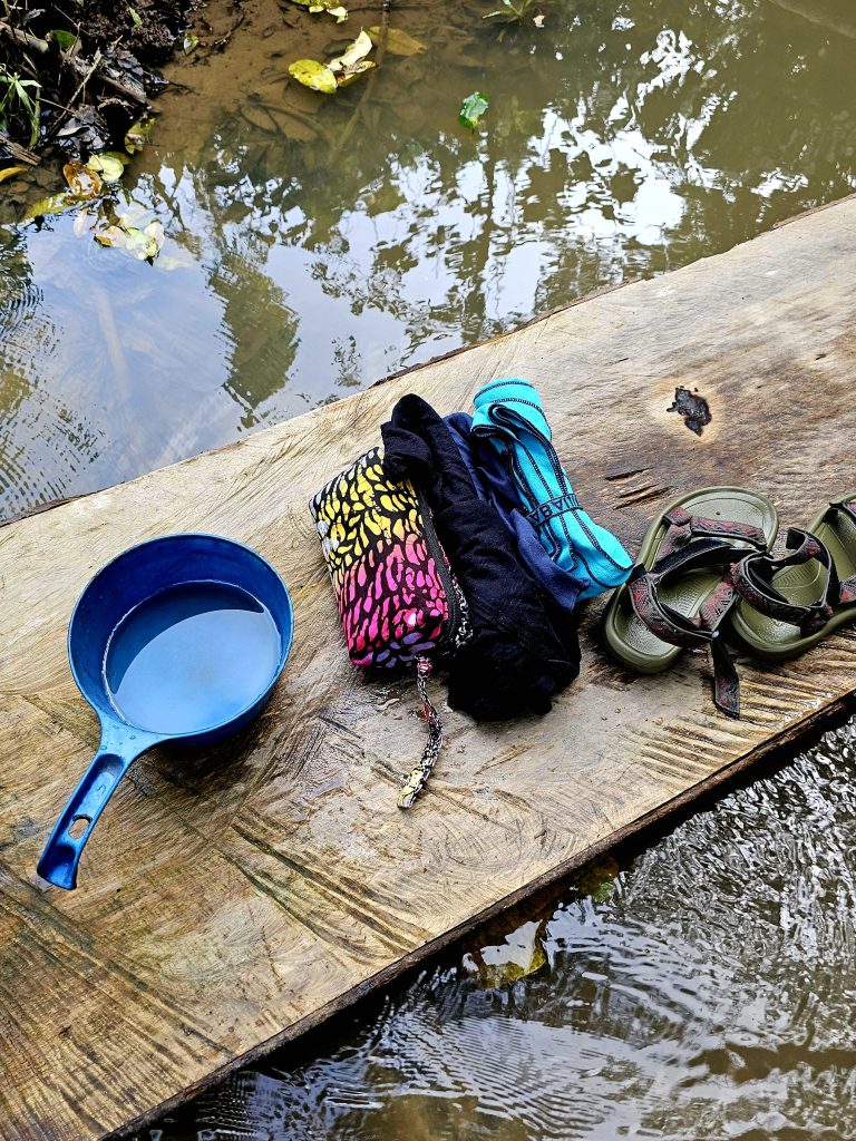 The river in Siberut where the Mentawai tribe bathes and uses as their natural toilet, surrounded by jungle.