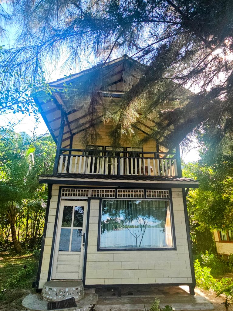 One of the wooden bungalows at Ricky Beach House by the beach in West Sumatra