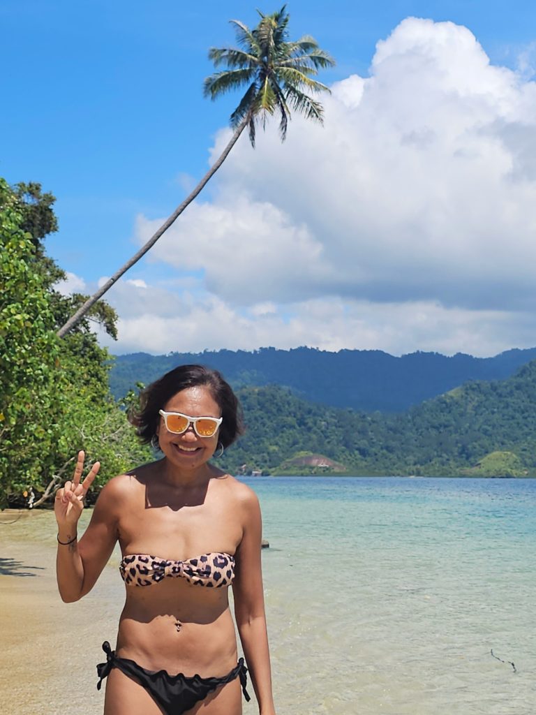 Travel writer Shannim at deserted Seronjong Island, West Sumatra - exploring Indonesia's hidden beaches away from tourist crowds