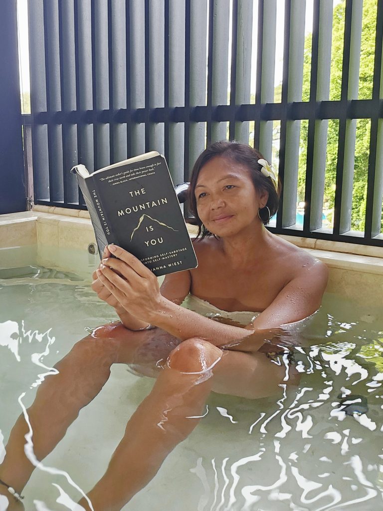 Shannim the writer enjoying the outdoor bathtub on private terrace at Shangri-La Rasa Sayang Rasa Wing Junior Suite, Penang, Malaysia