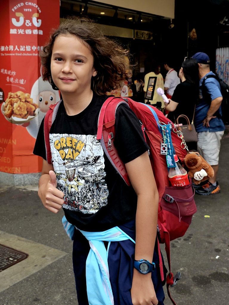 Boy with a rucksack travelling light