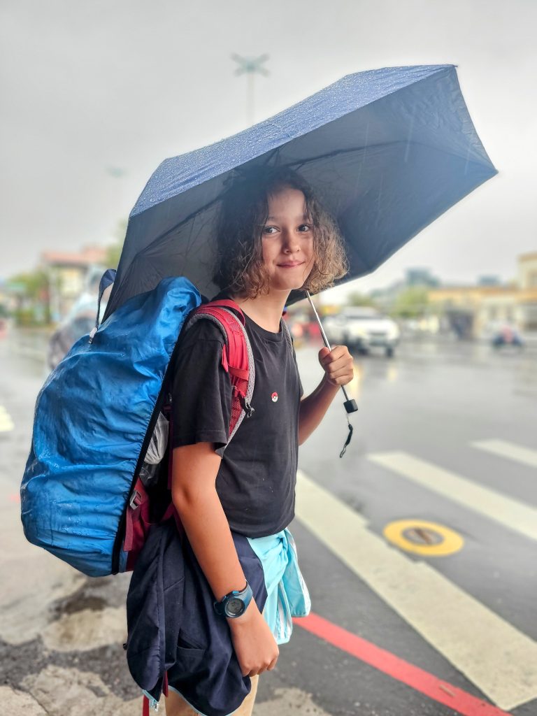 Young boy travelling light with a rucksack during a journey