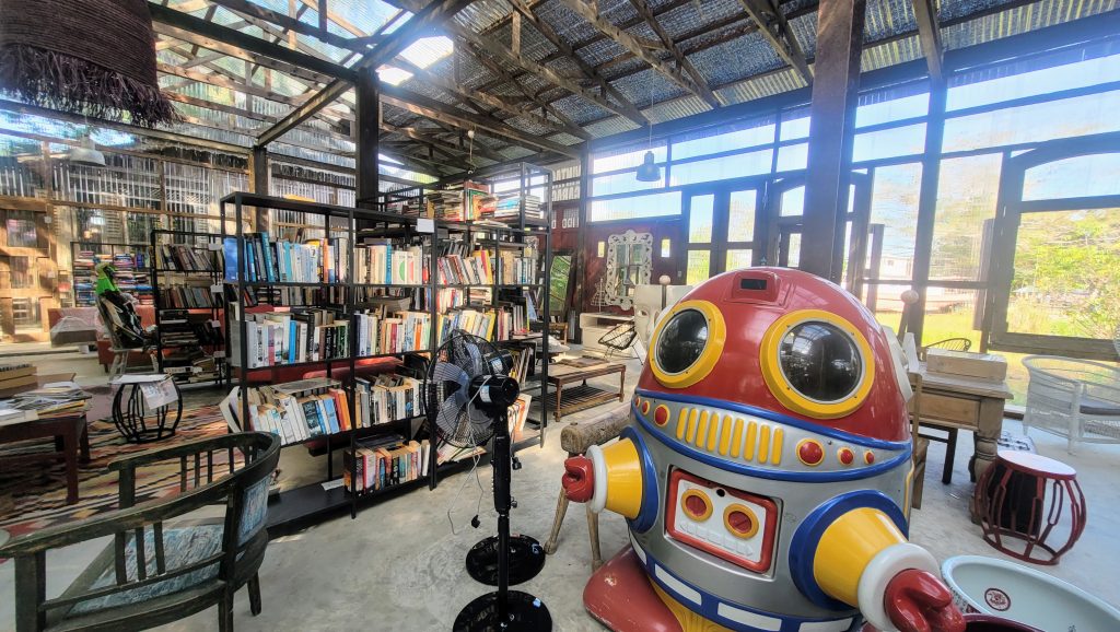 Book collection at Bon Ton Langkawi library with vintage Penguin Classics and war histories