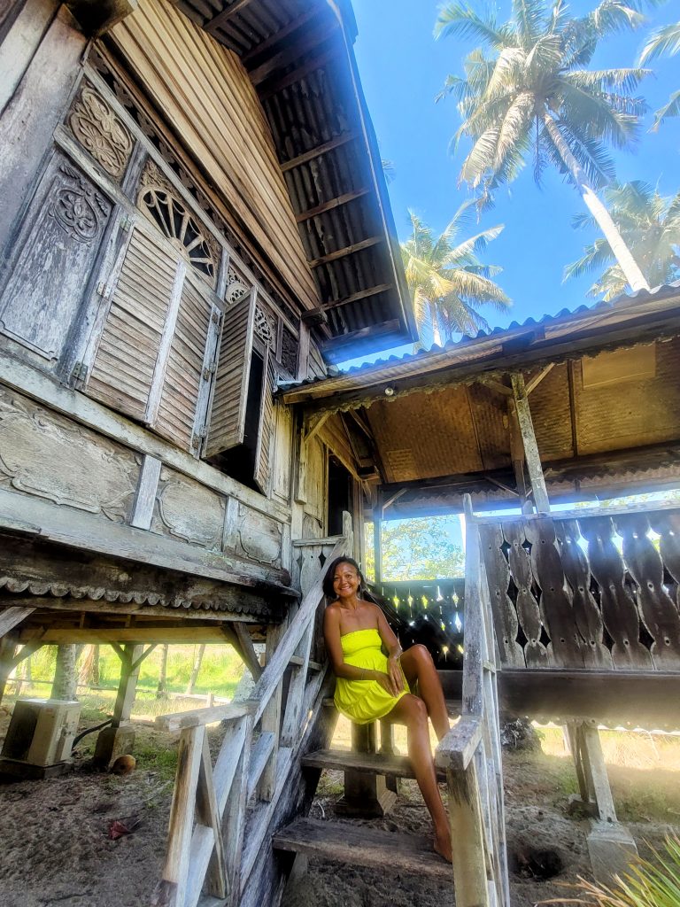 Travel writer Shannim at heritage Laguna villa staircase Bon Ton Resort Langkawi