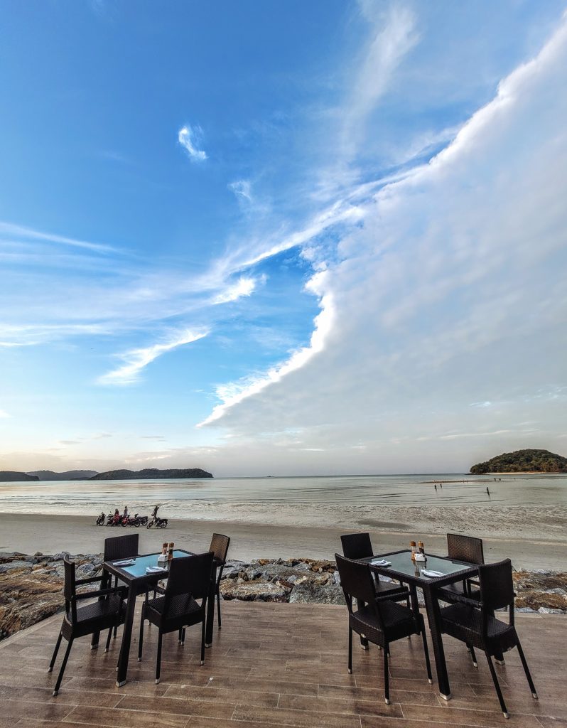 Outdoor seating area at Pelangi Grill overlooking the ocean Pelangi Beach Resort & Spa Langkawi