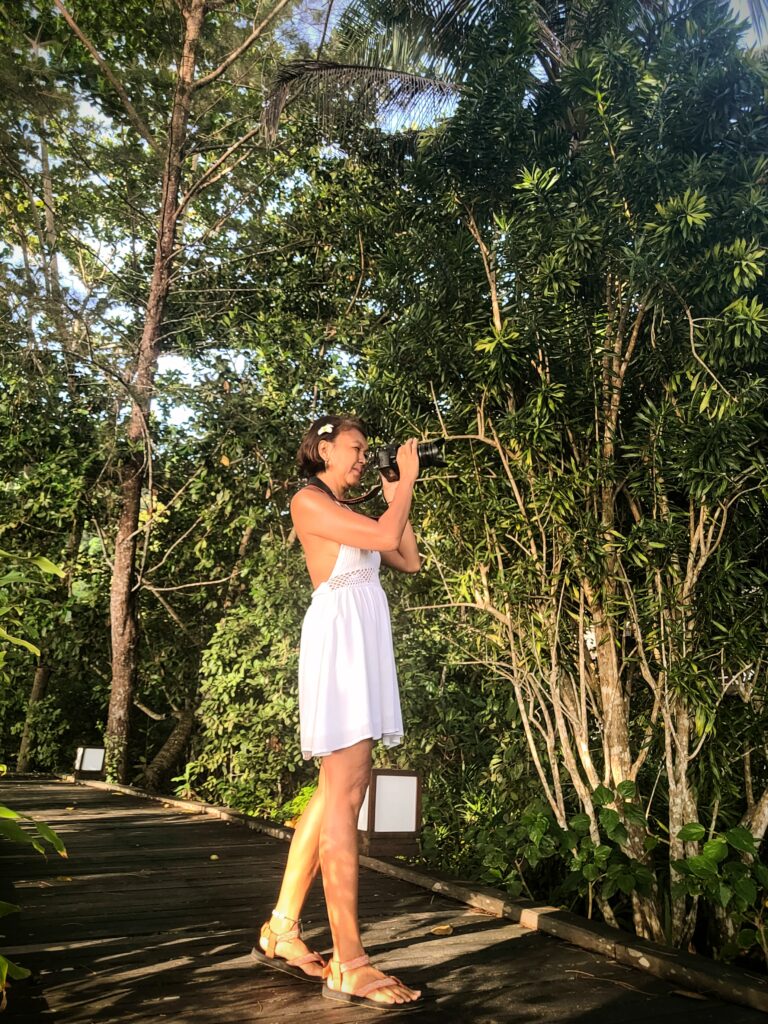 Travel writer Shannim photographing nature at Gaya Island Resort Sabah