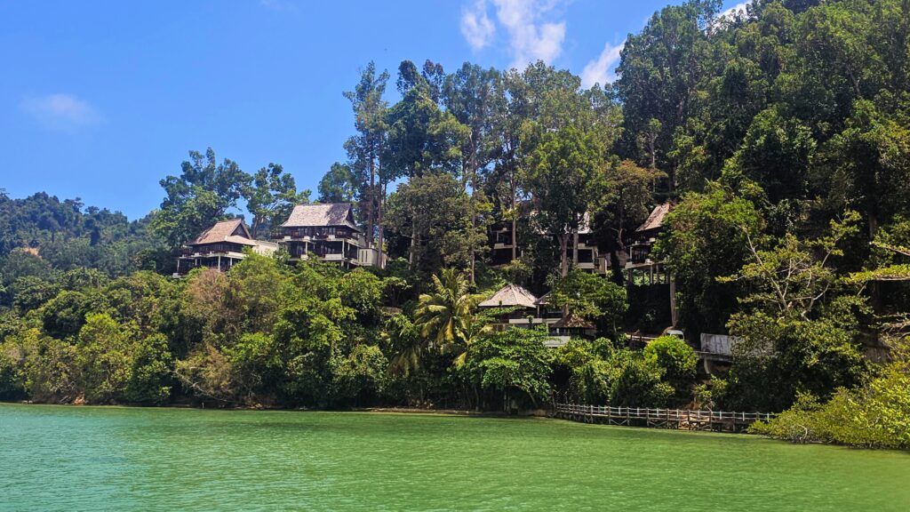 Gaya Island Resort with rainforest backdrop and ocean view in Sabah