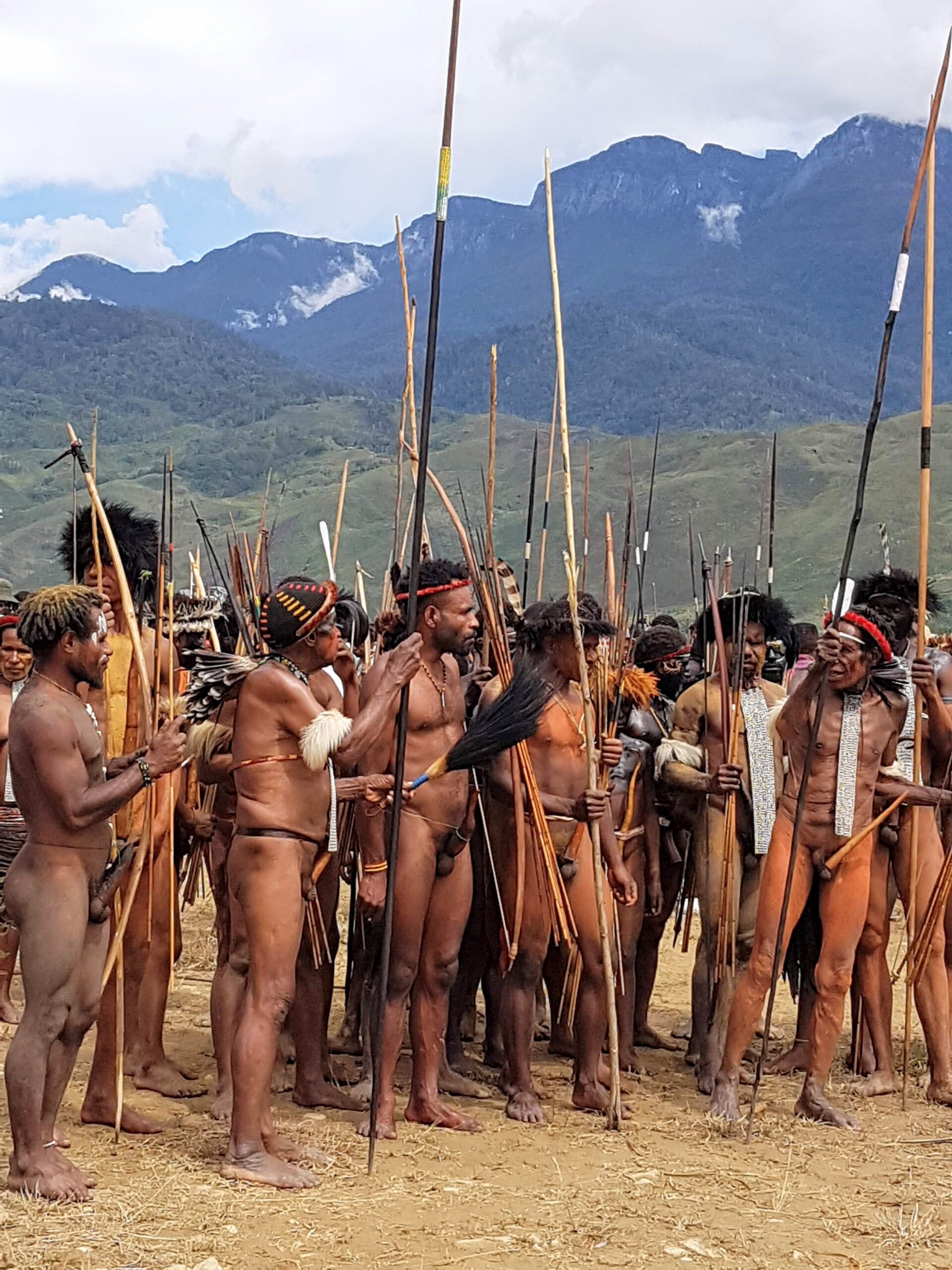 Dani warriors preparing for the mock tribal warfare at the Baliem Valley Festival.