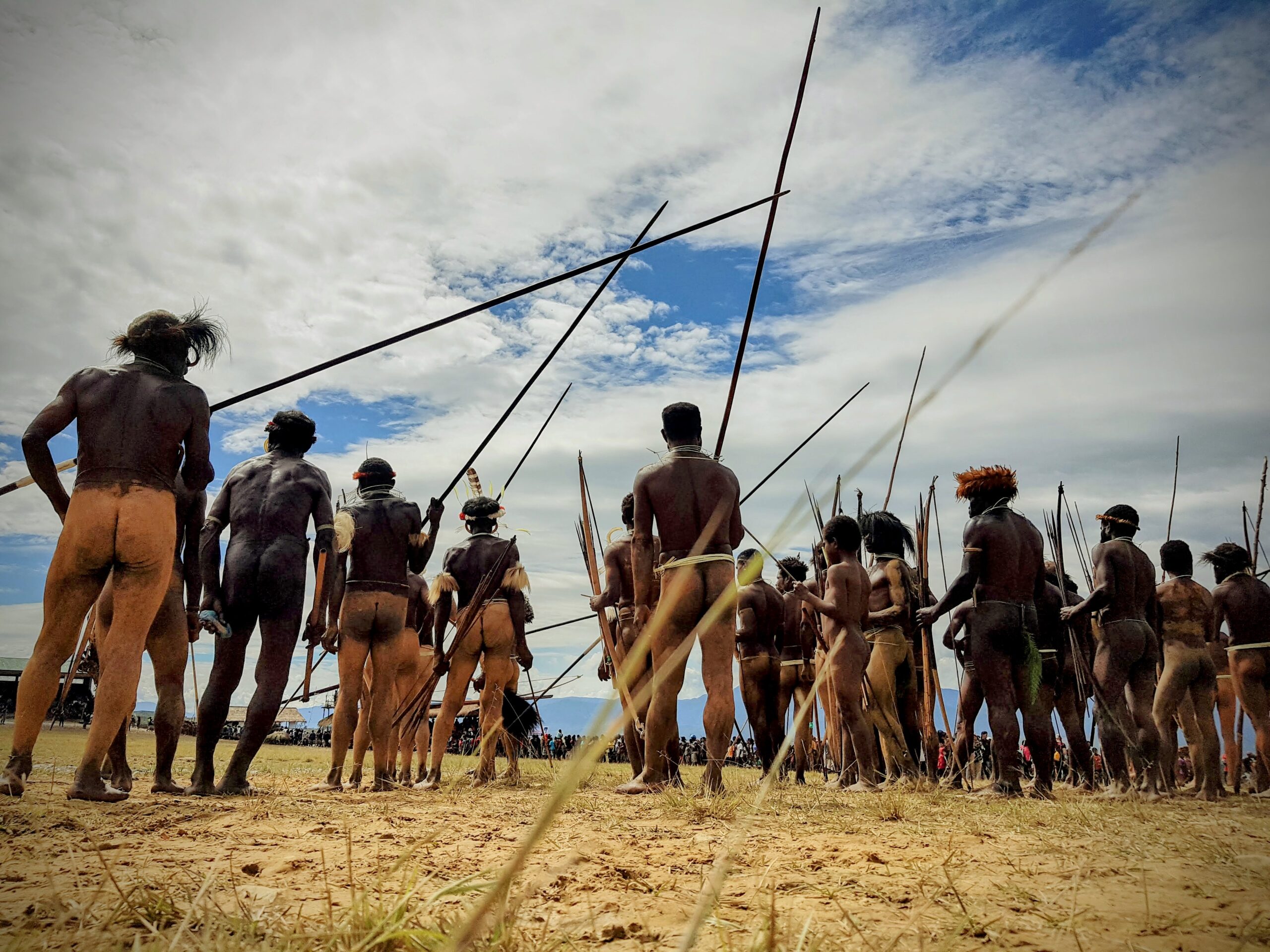 Members of the Dani Tribe preparing for the mock tribal battle during the Baliem Valley Festival.