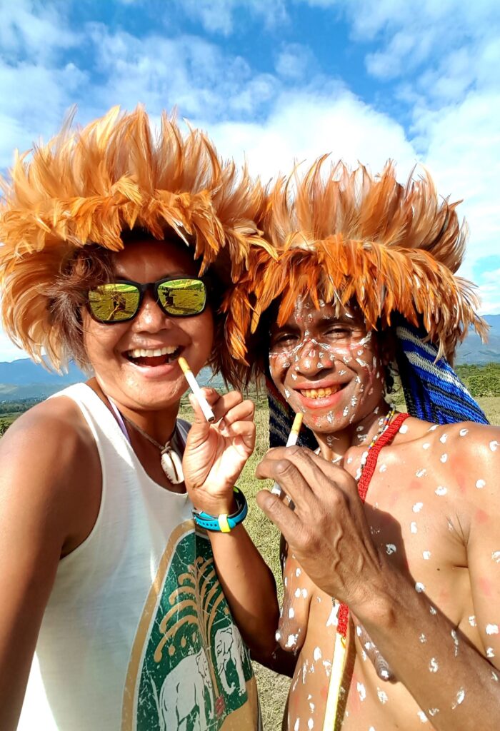 Travel writer Shannim with Dani locals at the Baliem Valley Festival.