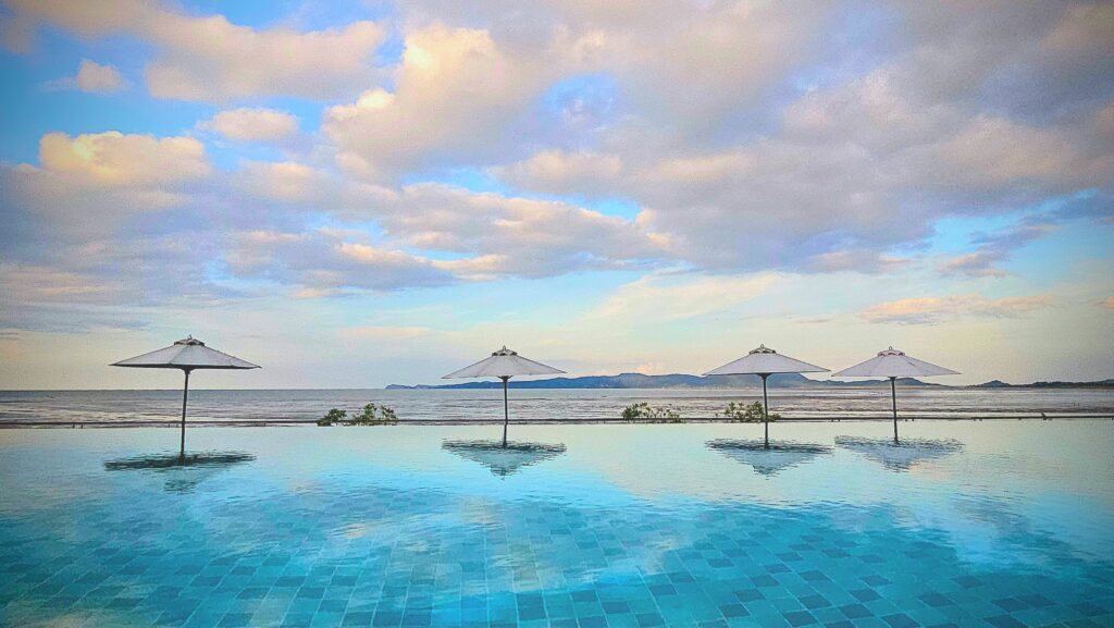 Infinity pool at Cove 55 boutique resort overlooking the South China Sea in Santubong, Sarawak