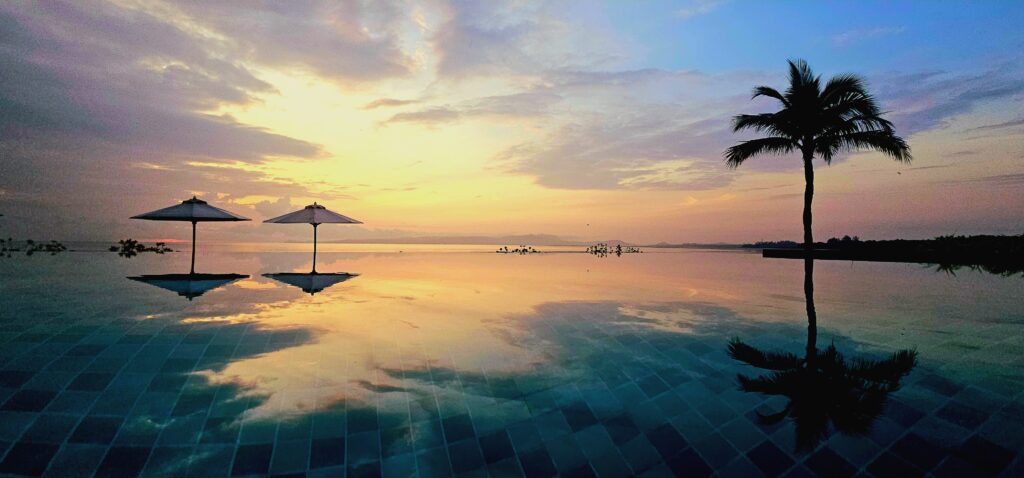 Infinity pool at sunrise at Cove 55 boutique resort in Santubong, Sarawak
