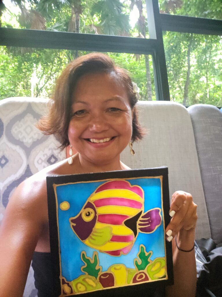 Malaysian travel writer Shannim with a batik painting at Aloft Langkawi Pantai Tengah