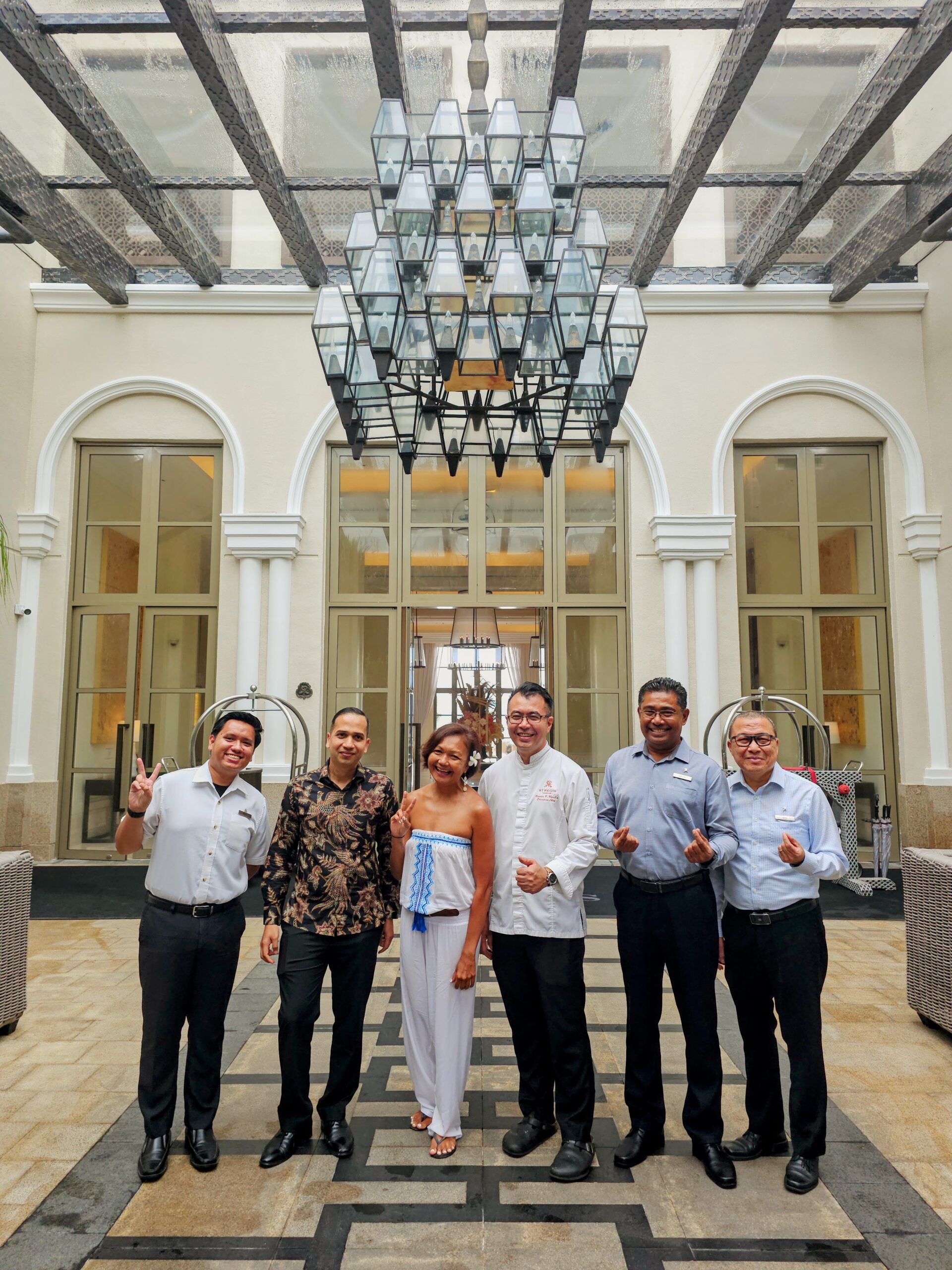 Malaysian travel writer Shannim with the team at The St. Regis Langkawi