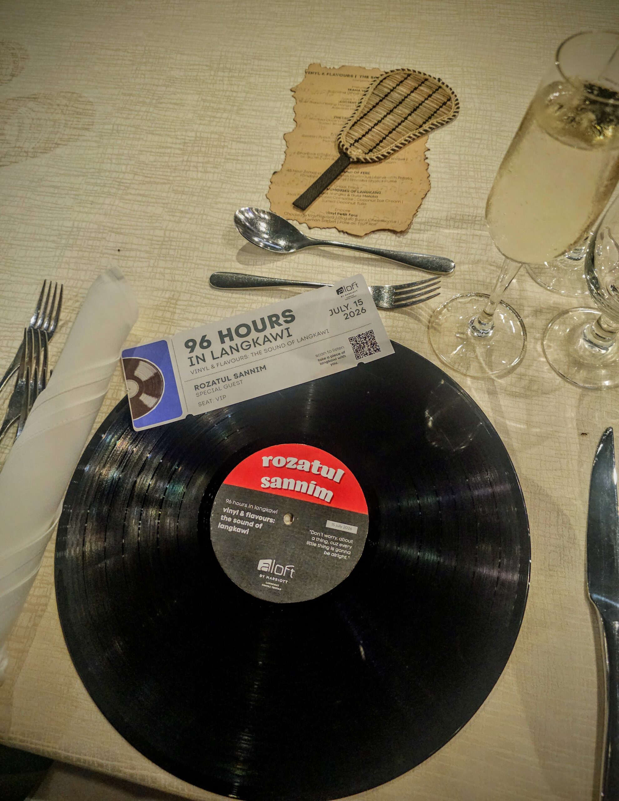 Personalised vinyl record at a dinner hosted by Aloft Langkawi Pantai Tengah